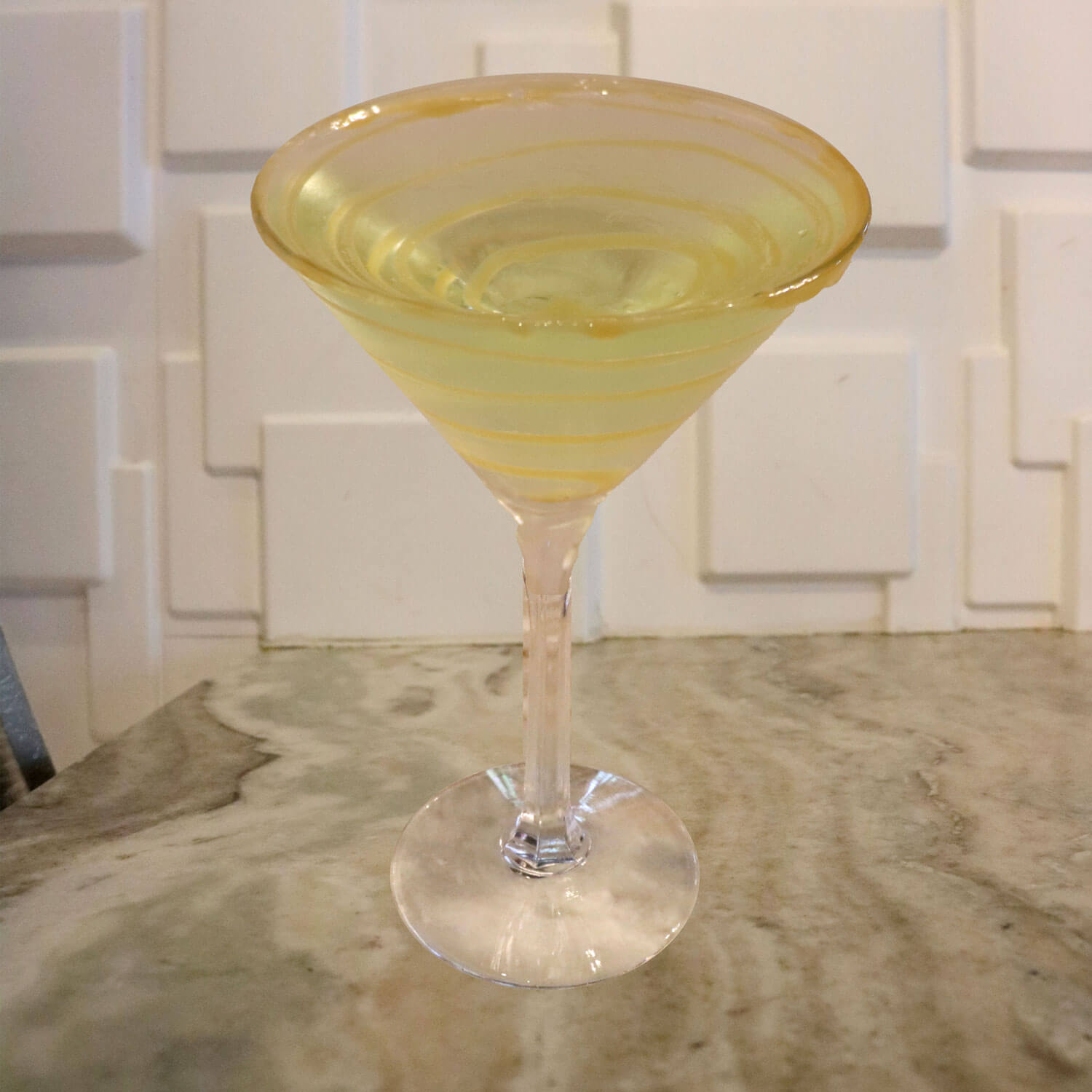 Apple Vodka, Apple Pucker, Buttershots, and Caramel Swirls With a Caramel Rim