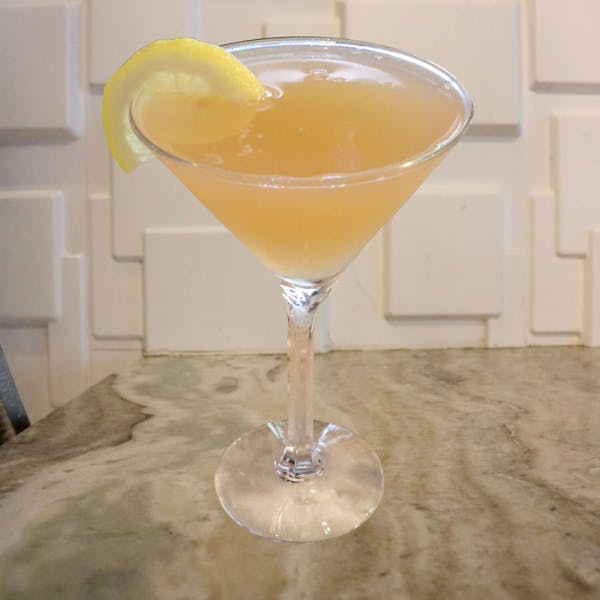 Deep Eddy Lemon Vodka, Bacardà Rum, Triple Sec, Lime Juice, and a Splash of Grapefruit Juice. Garnished With a Lemon Slice