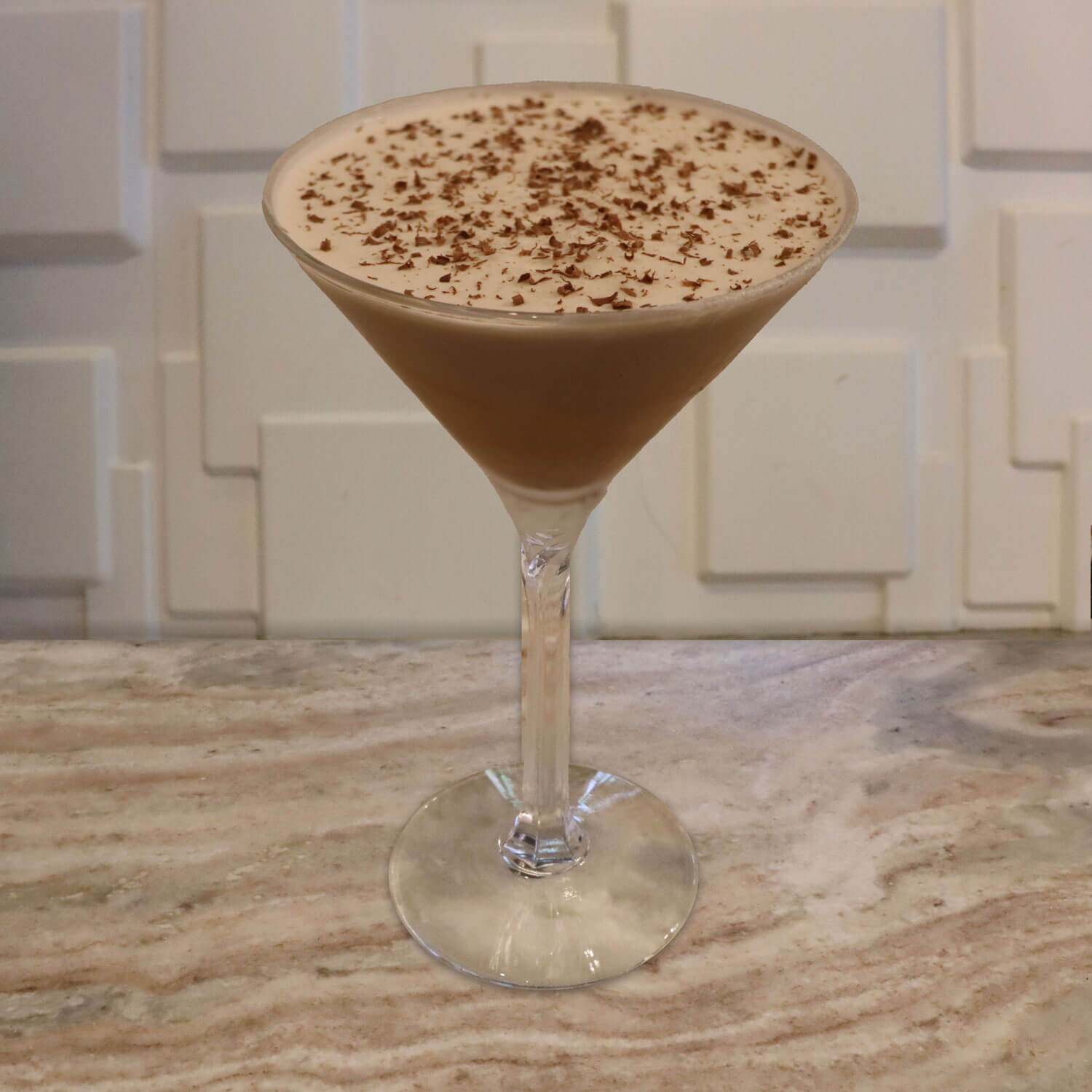 Chocolate Vodka, Vanilla Vodka, Chocolate Liqueur. Garnished with Fresh Shaved Chocolate