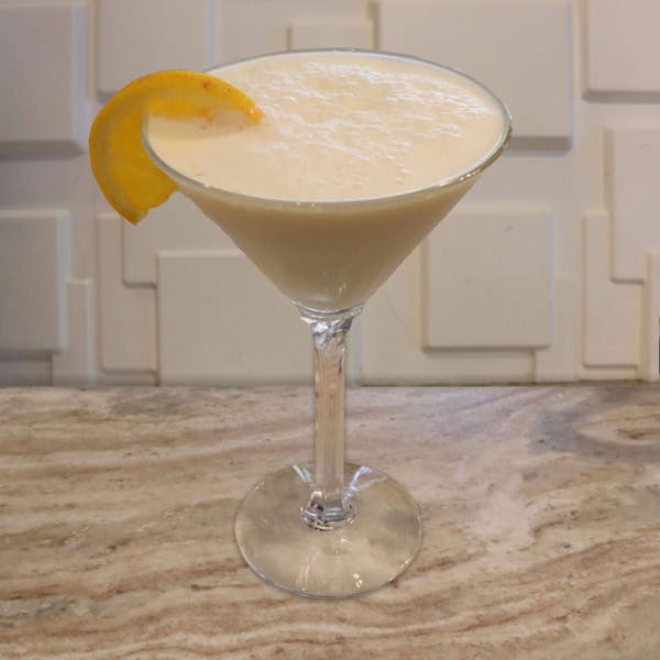 Deep Eddy Orange Vodka, Dr. Mc Gillicuddy’s Vanilla, and A Splash of Orange Juice, and Cream. Garnished with An Orange Slice