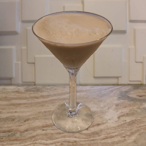 Root Beer Whiskey, Dr. McGillicuddy’s Vanilla, Chocolate Liqueur, Cream, Whipped Cream Shaken in And a Splash of Coke