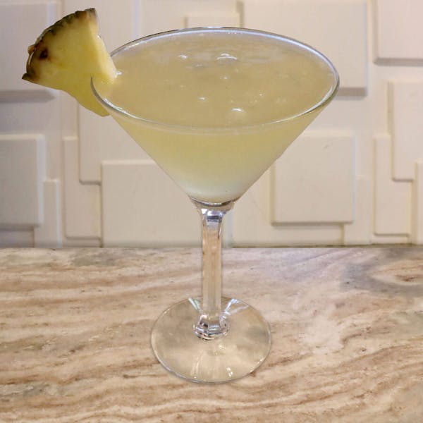 New Amsterdam Mango Vodka, Muddled With Fresh JalapeƱos, Simple Syrup, Pineapple Juice, and Fresh Lime