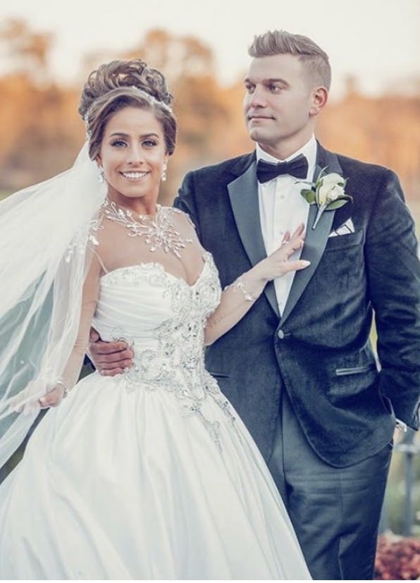 a man and a woman in a wedding dress