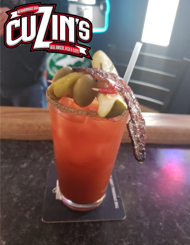 a large hotdog sitting on a table