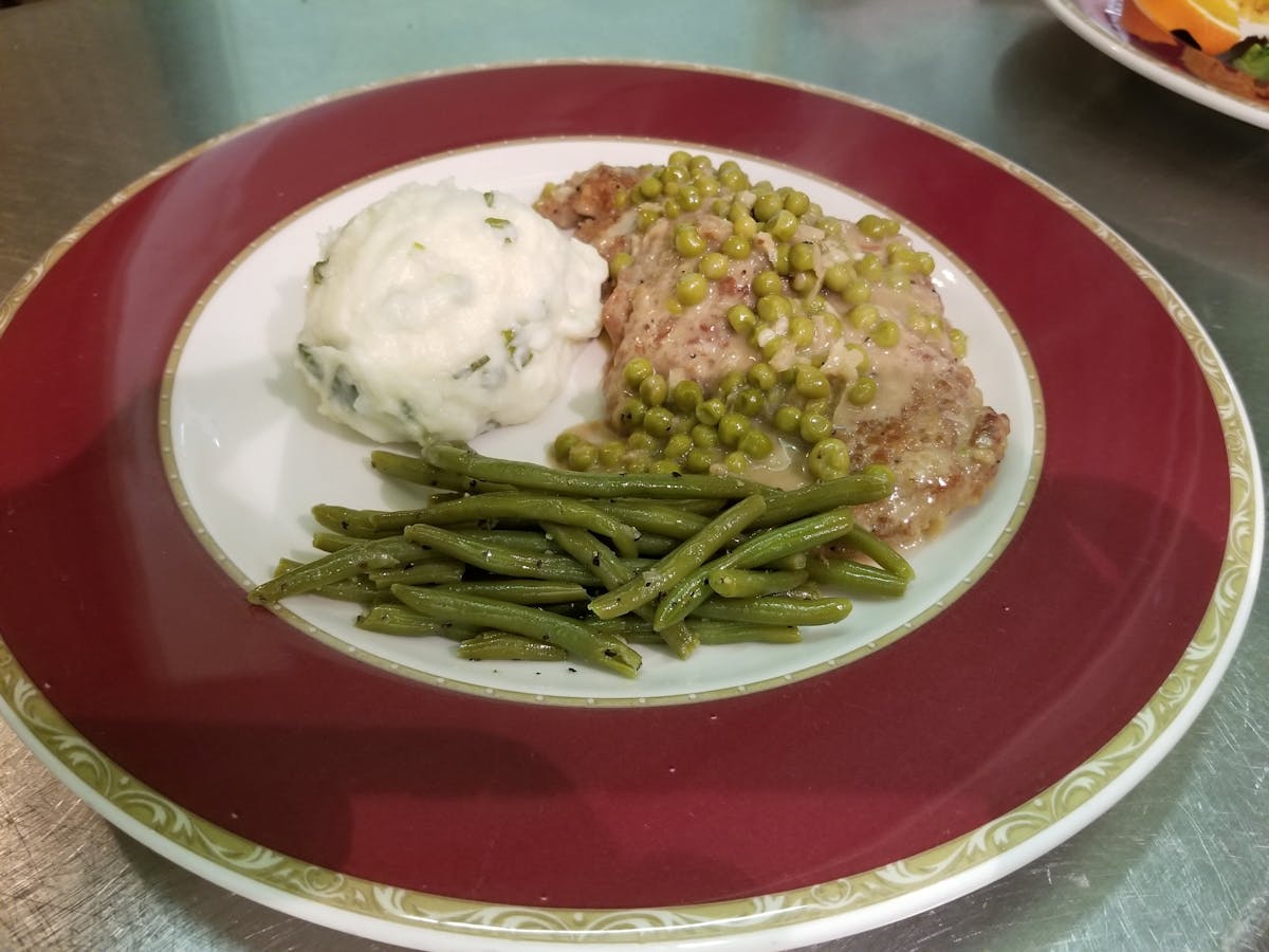 Veal with Cream & Peas