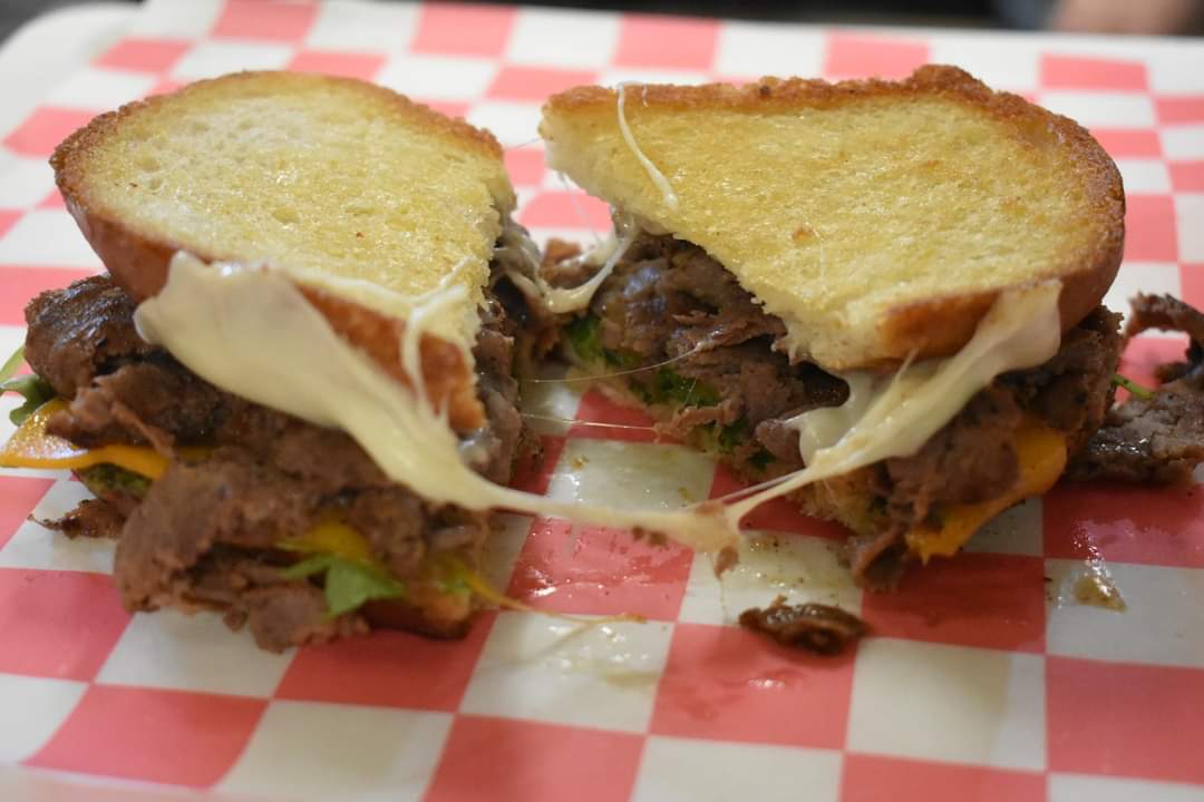 a sandwich cut in half on a plate