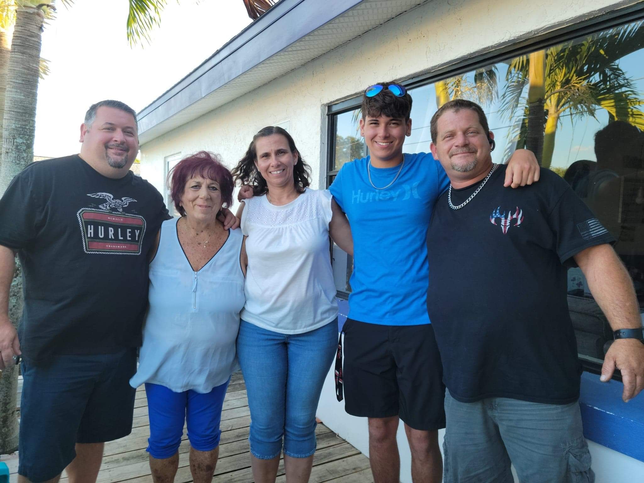 a group of people posing for the camera
