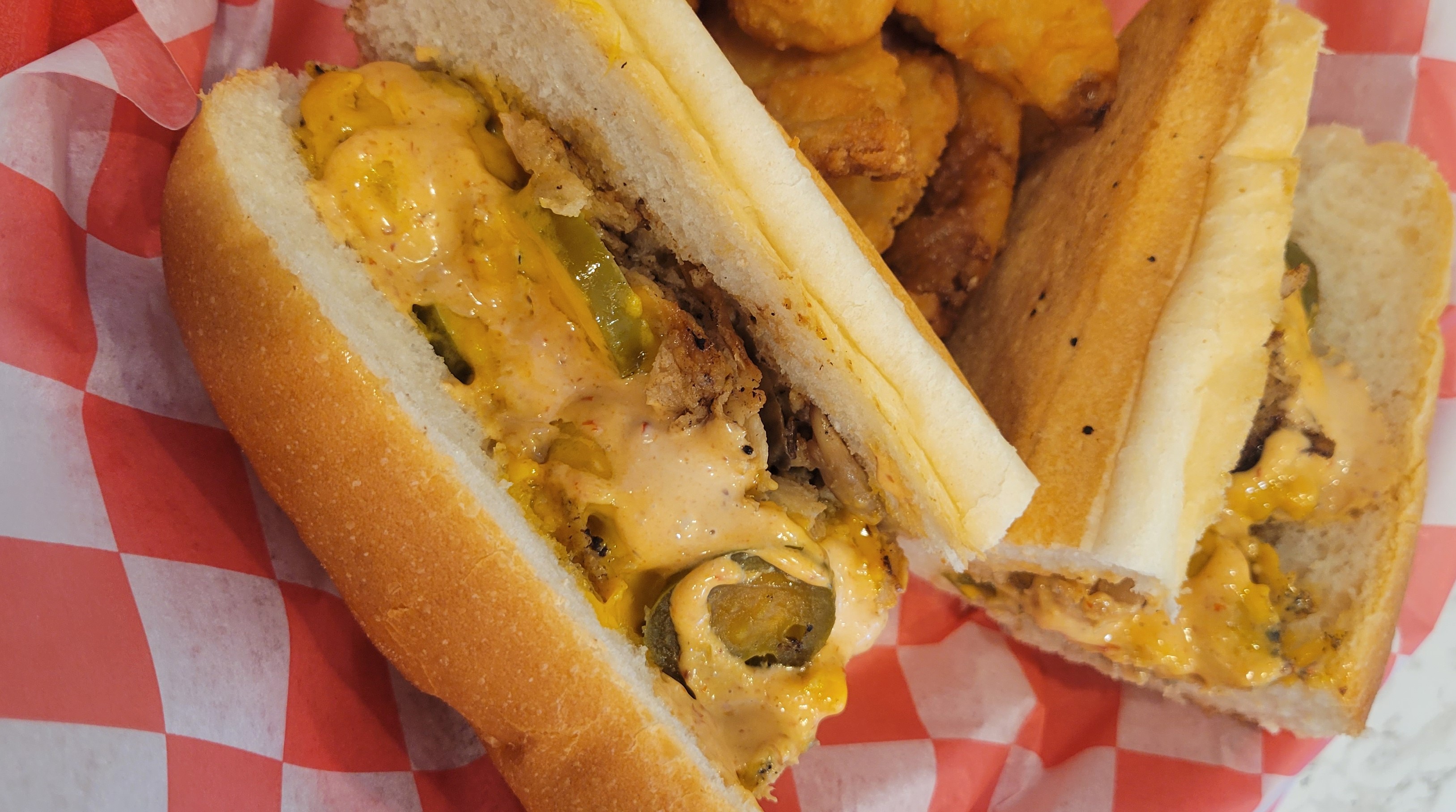a close up of a hot dog on a bun