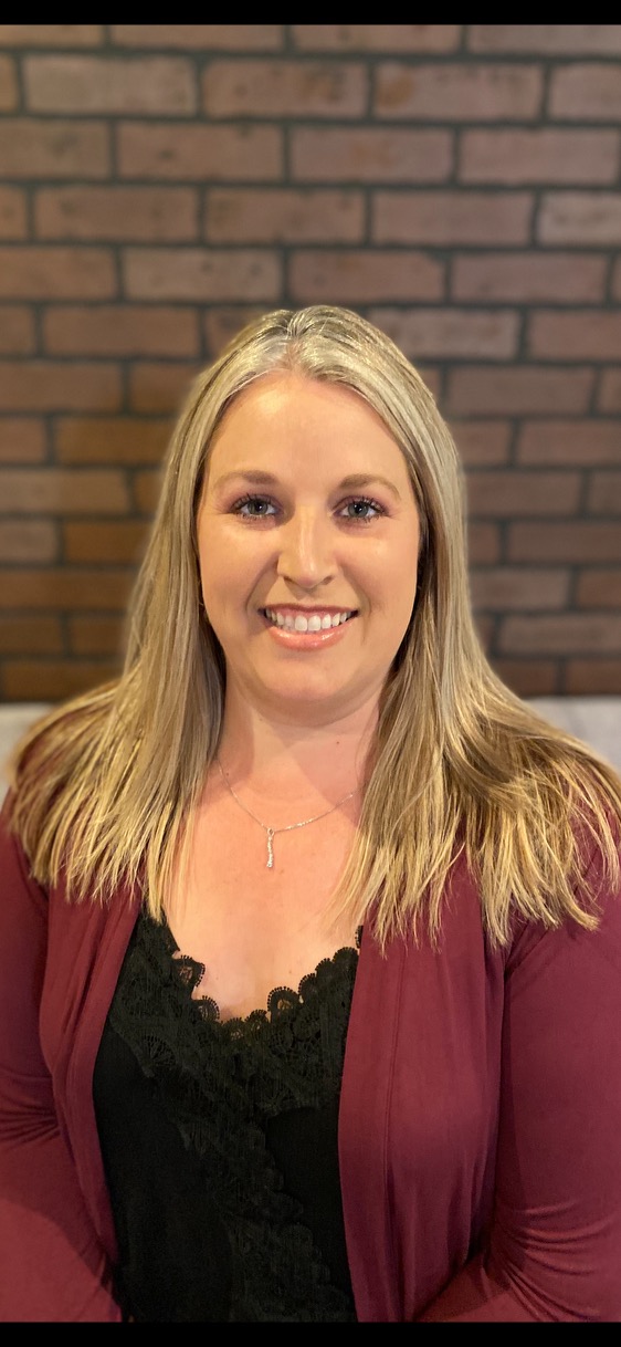 a woman smiling for the camera