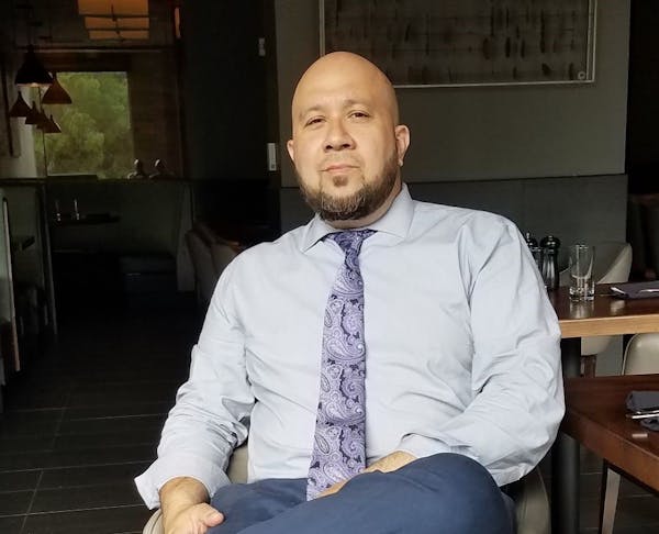 Cihan Cobanoglu wearing a neck tie and a white shirt
