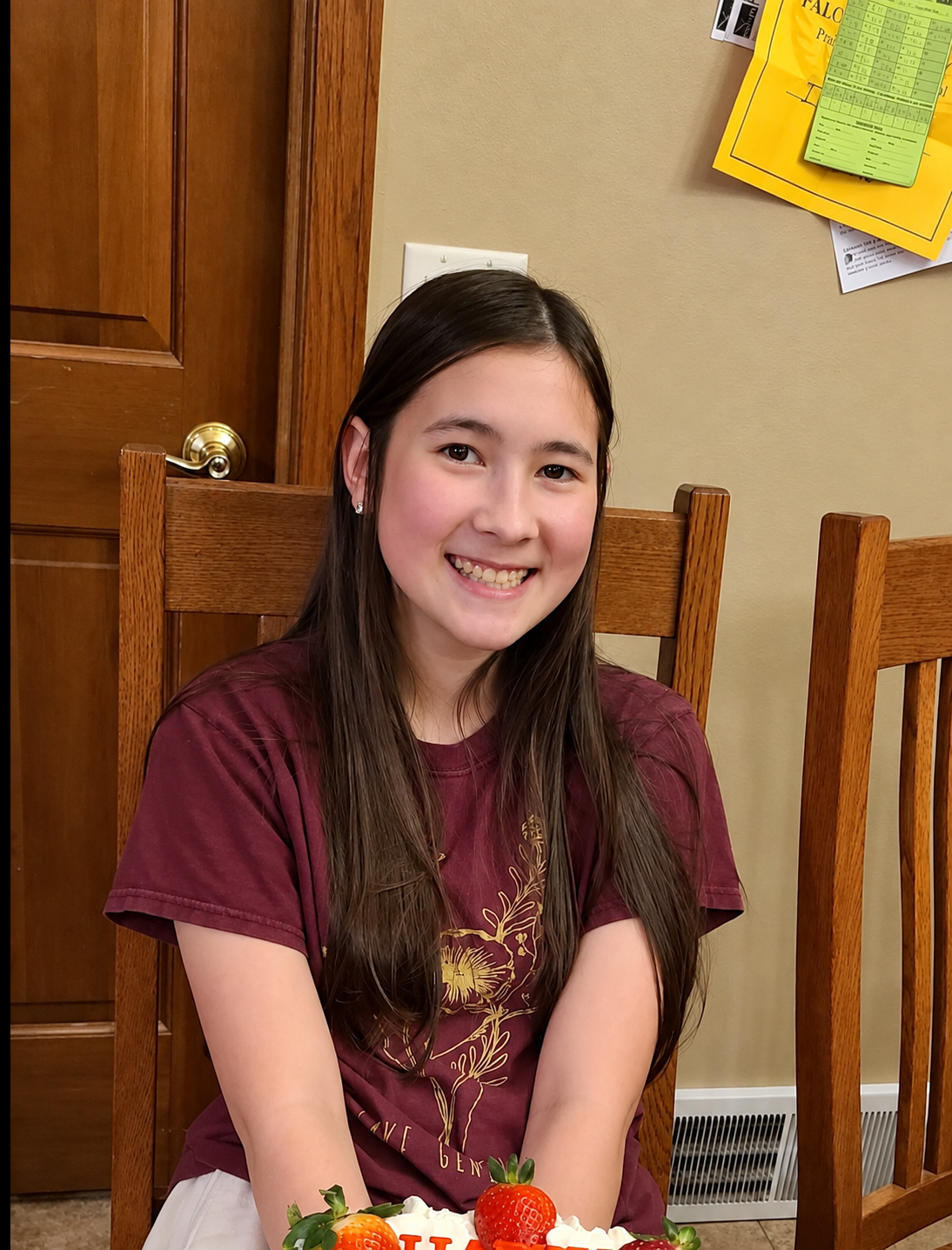a girl sitting in a chair