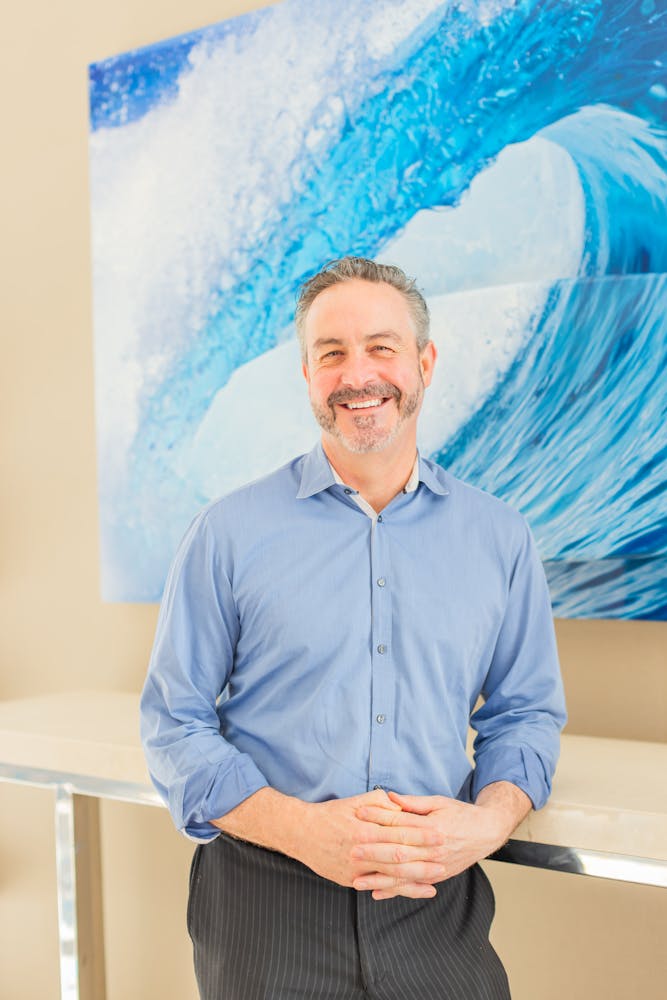 a man wearing a suit and tie