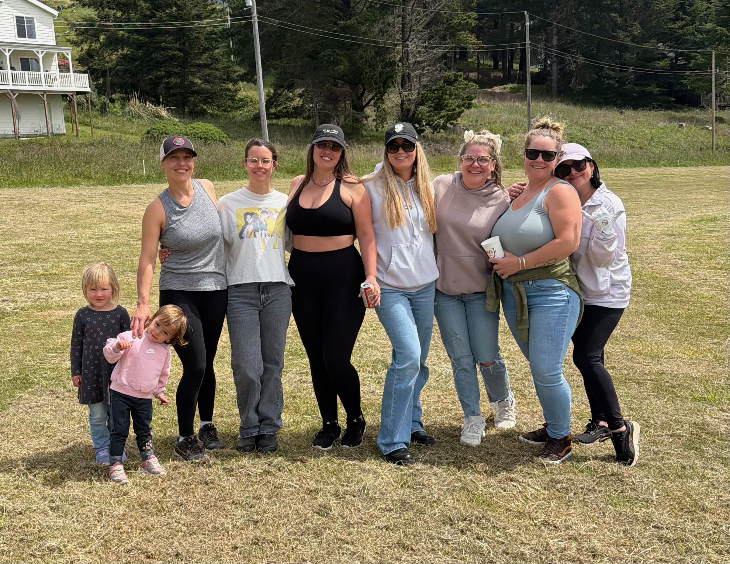 a group of women posing for a photo