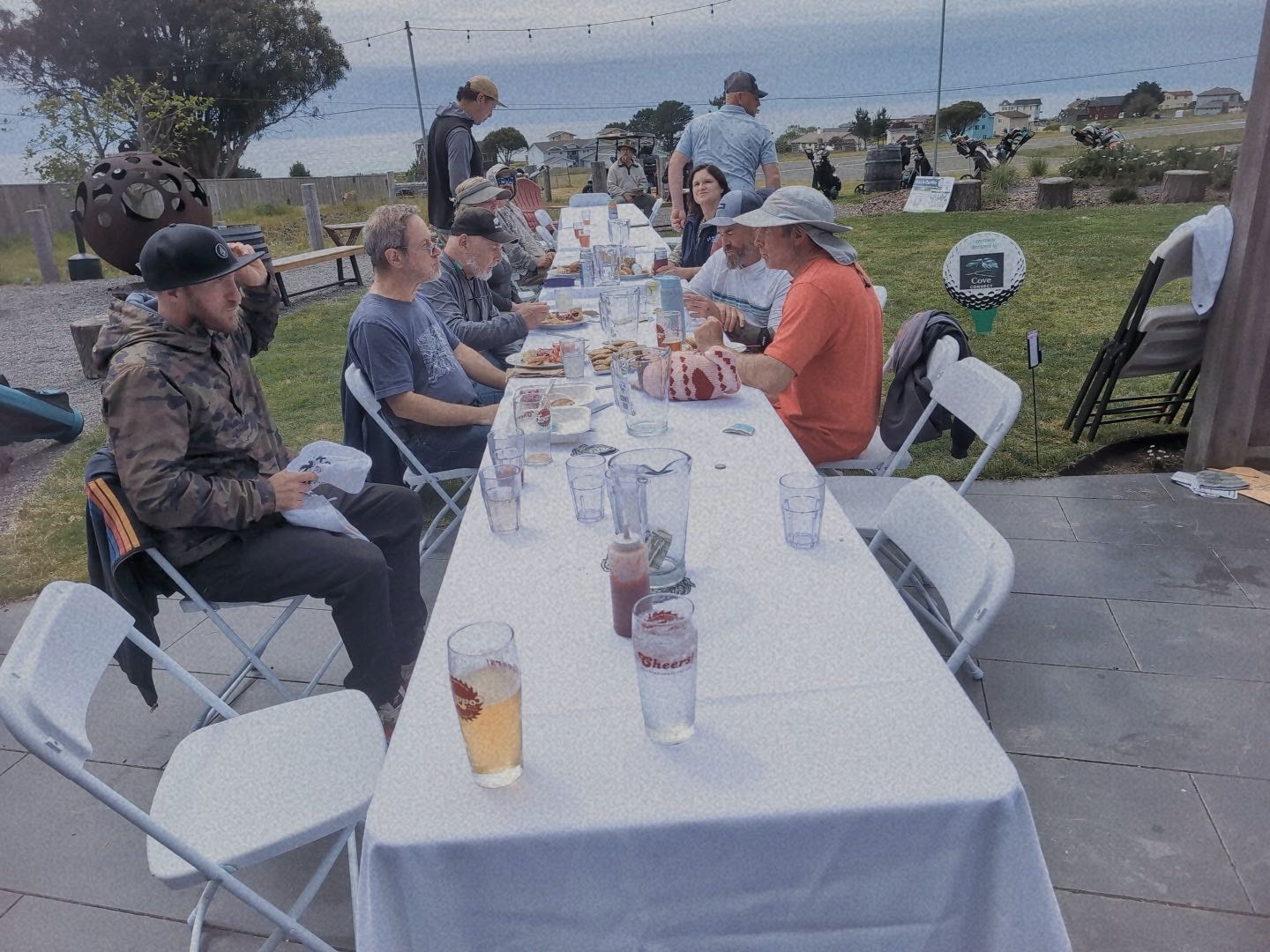 a group of people sitting at a table