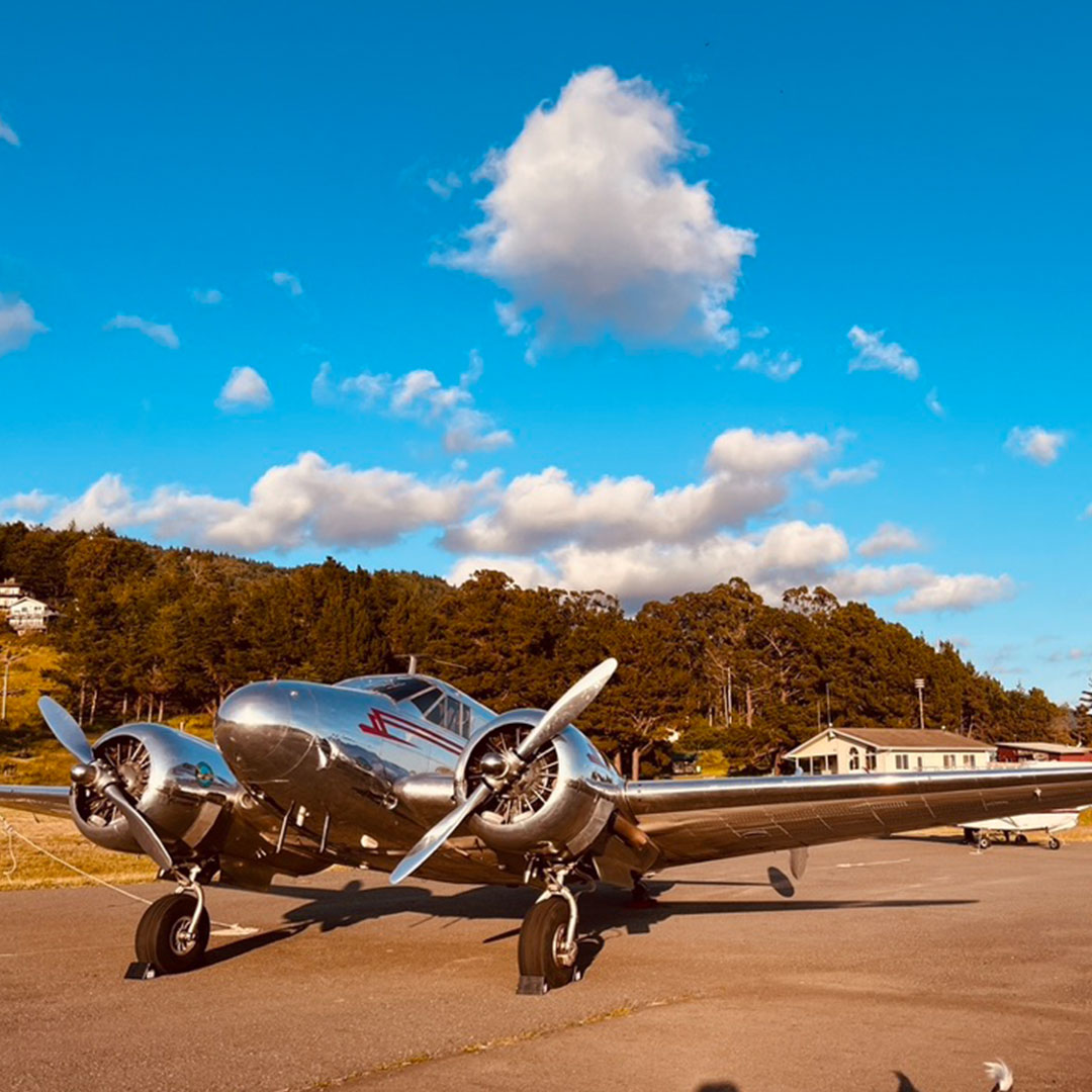 a fighter jet sitting on top of a motorcycle
