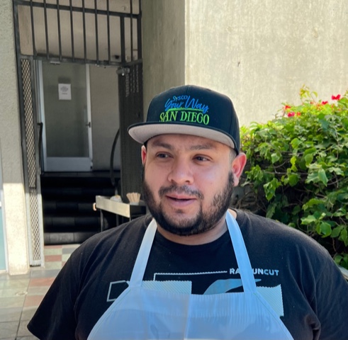 Ram Kamal Mukherjee wearing a hat
