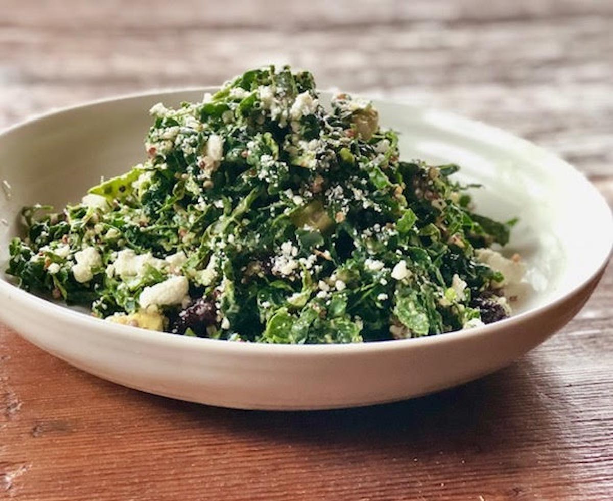 a bowl of food with broccoli