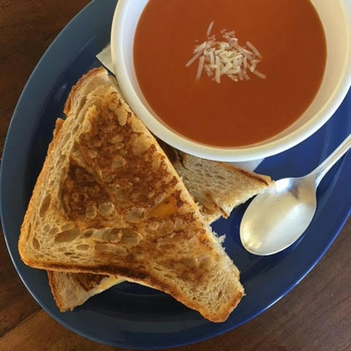 a plate of food and a cup of coffee