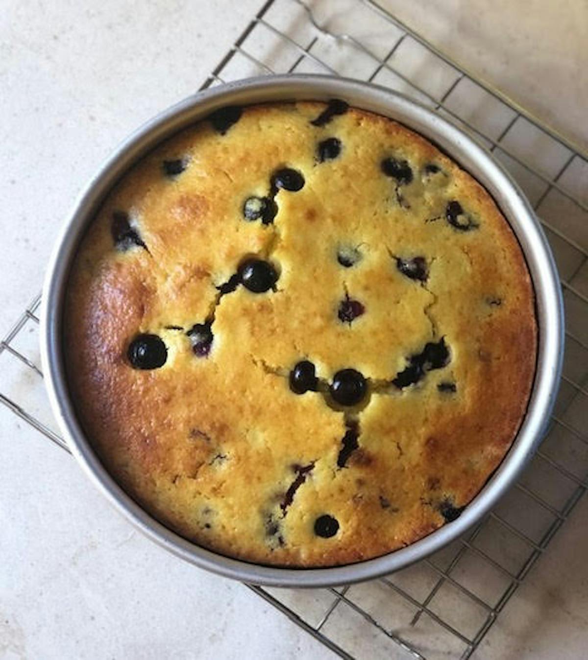 a pizza sitting on top of a stove