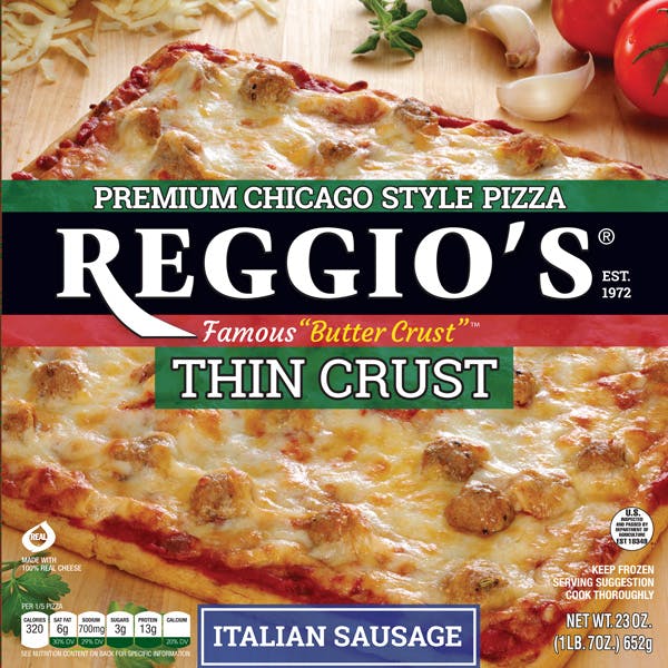 a pizza sitting on top of a sign