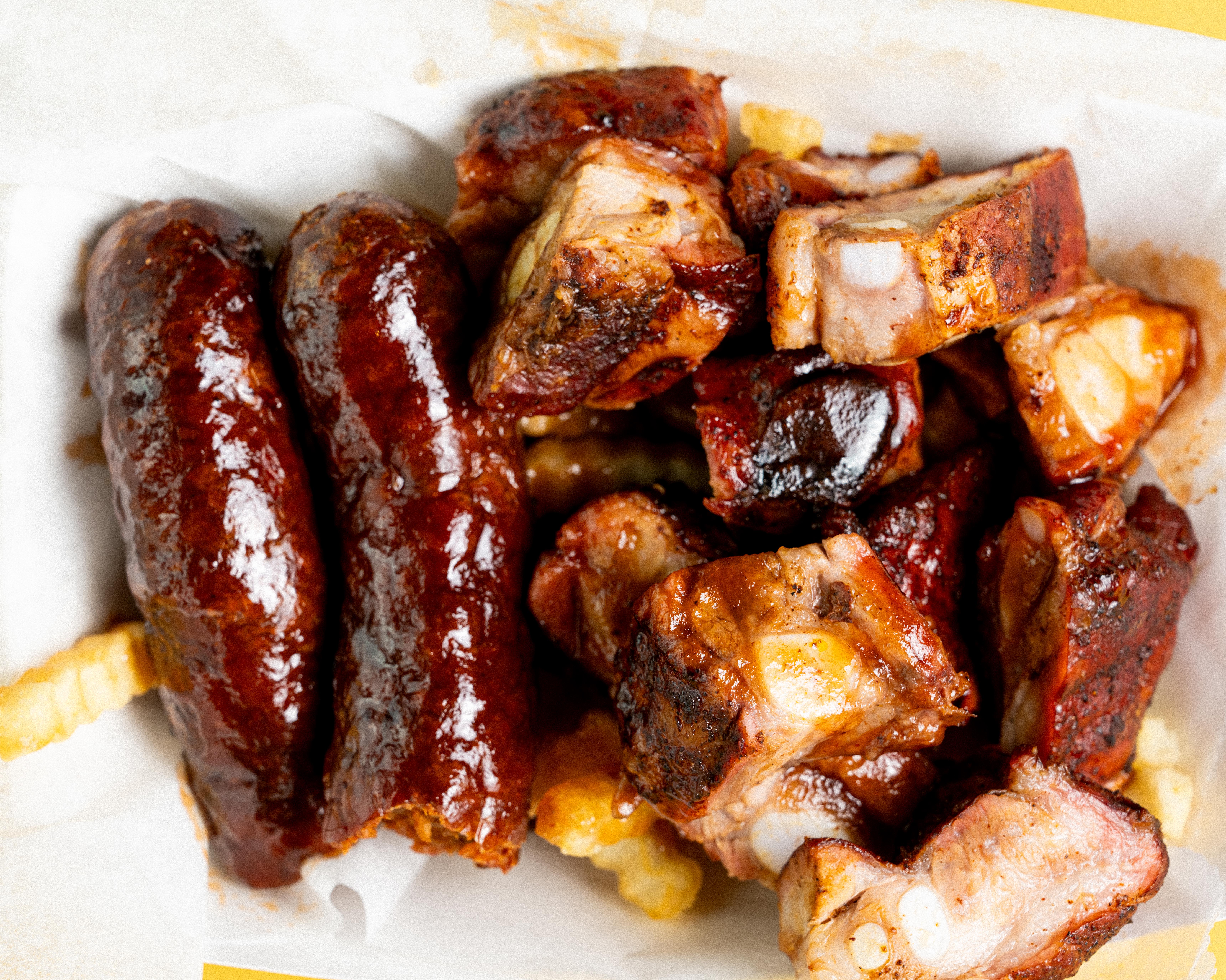 a sandwich sitting on top of a paper plate