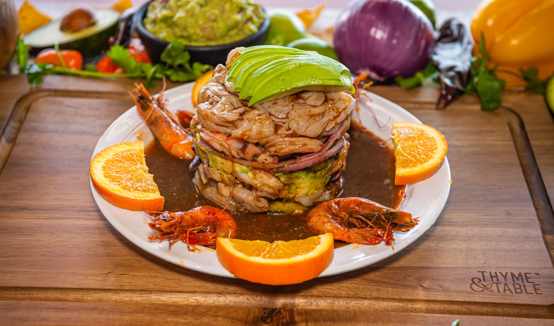 a plate of food sitting on top of a wooden table