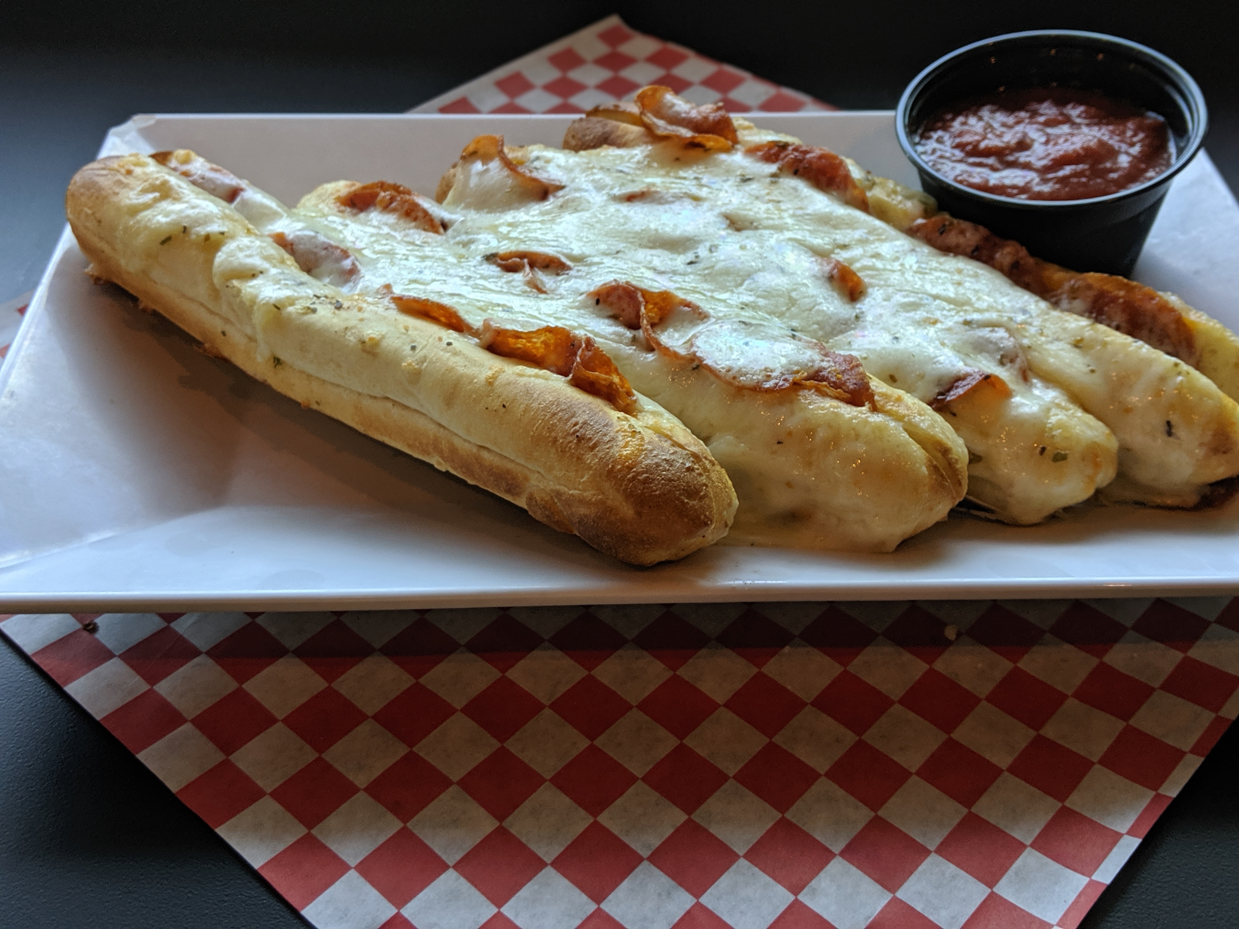 a hot dog sitting on a table