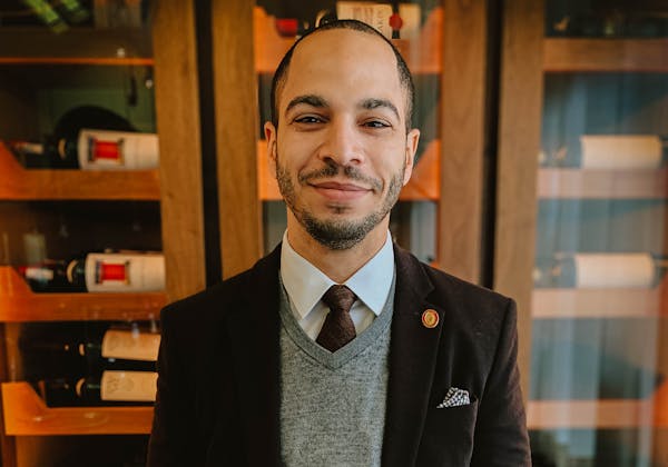a man wearing a suit and tie