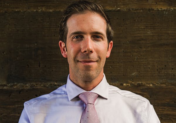 a man wearing a suit and tie