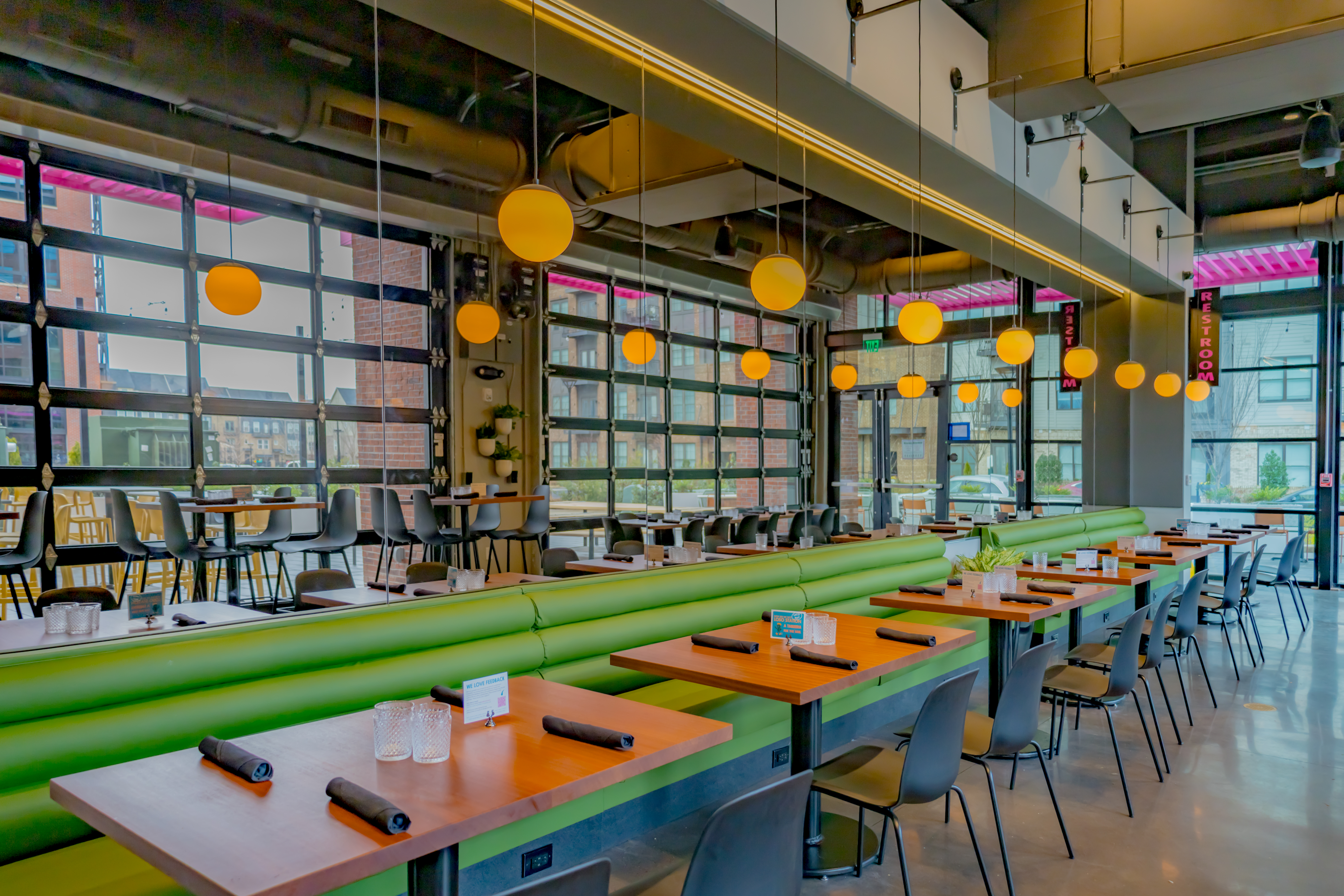 a row of wooden benches sitting on top of a table