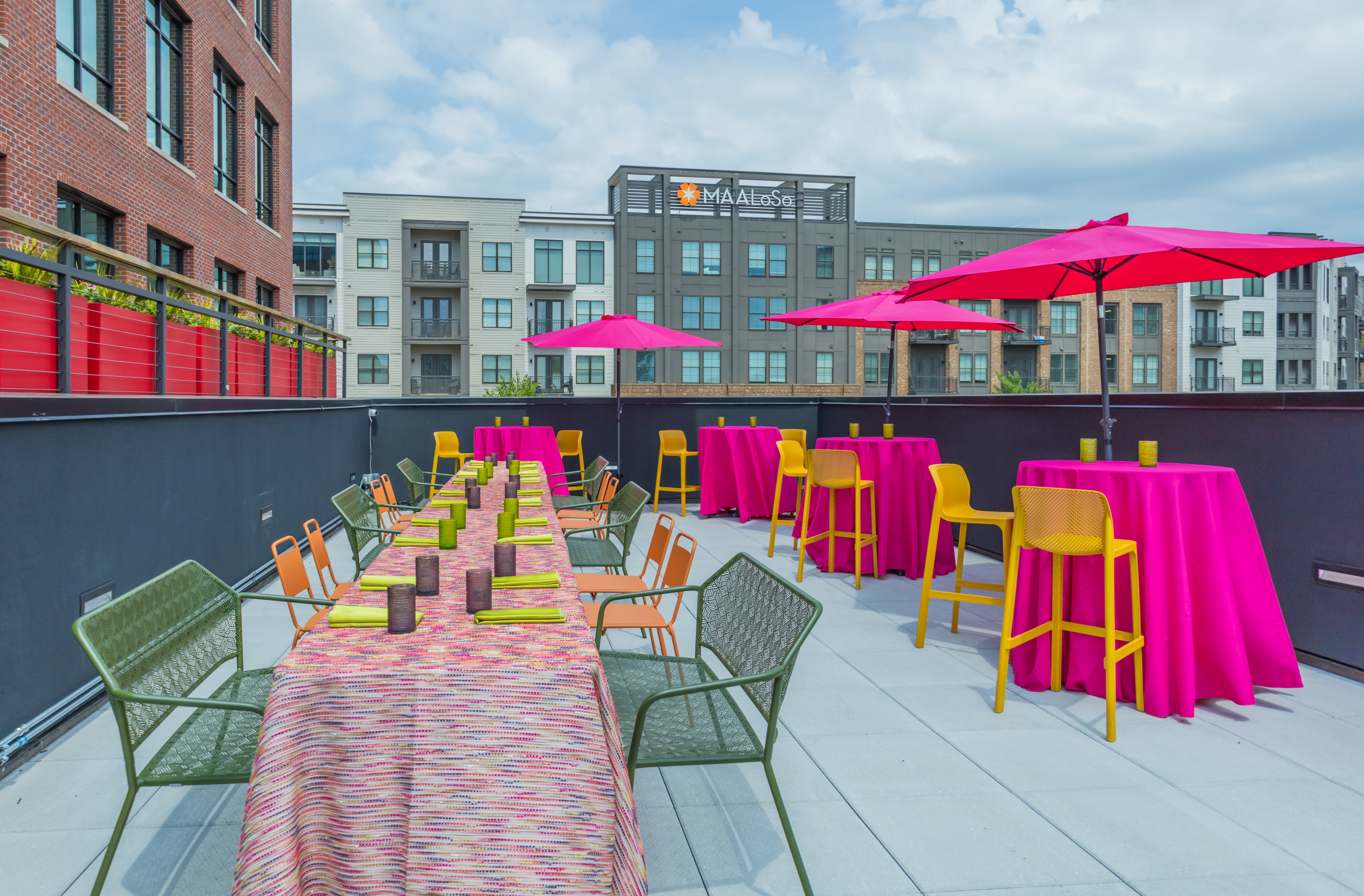 a group of colorful umbrellas sitting next to a building