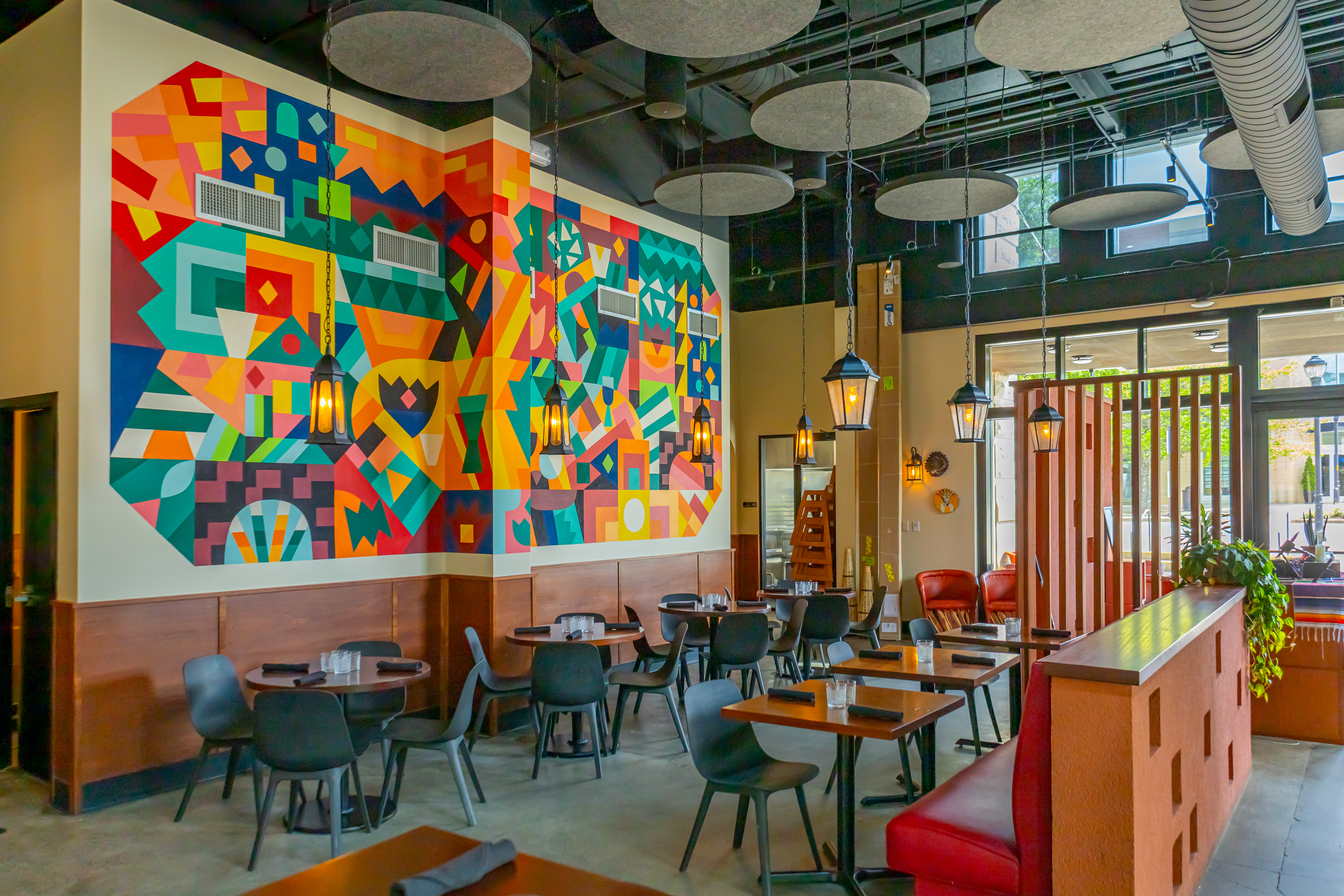 a room with tables and chairs