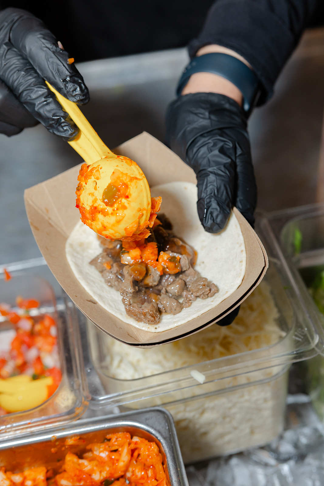 a person holding a bowl of food