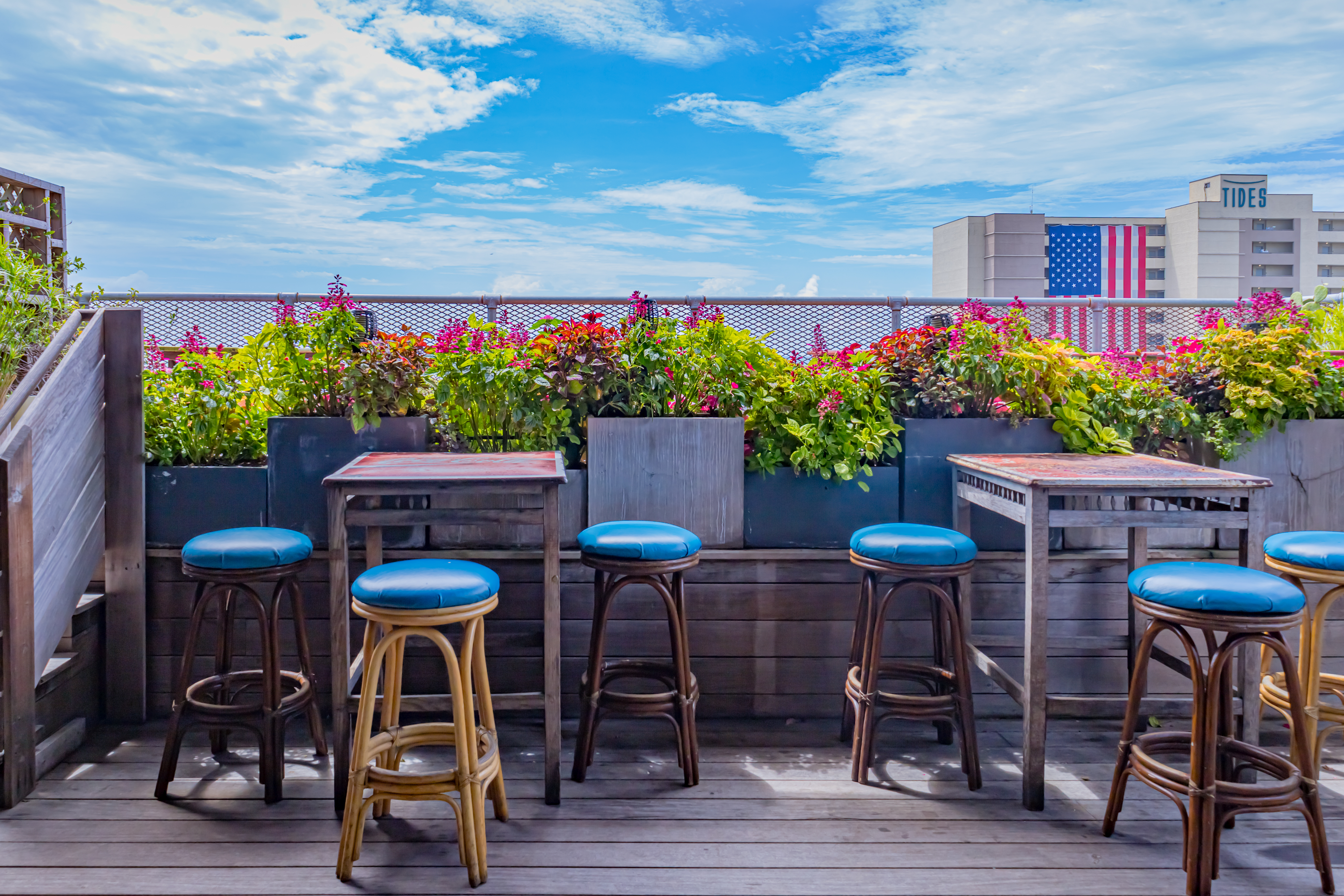 a table topped with a blue umbrella