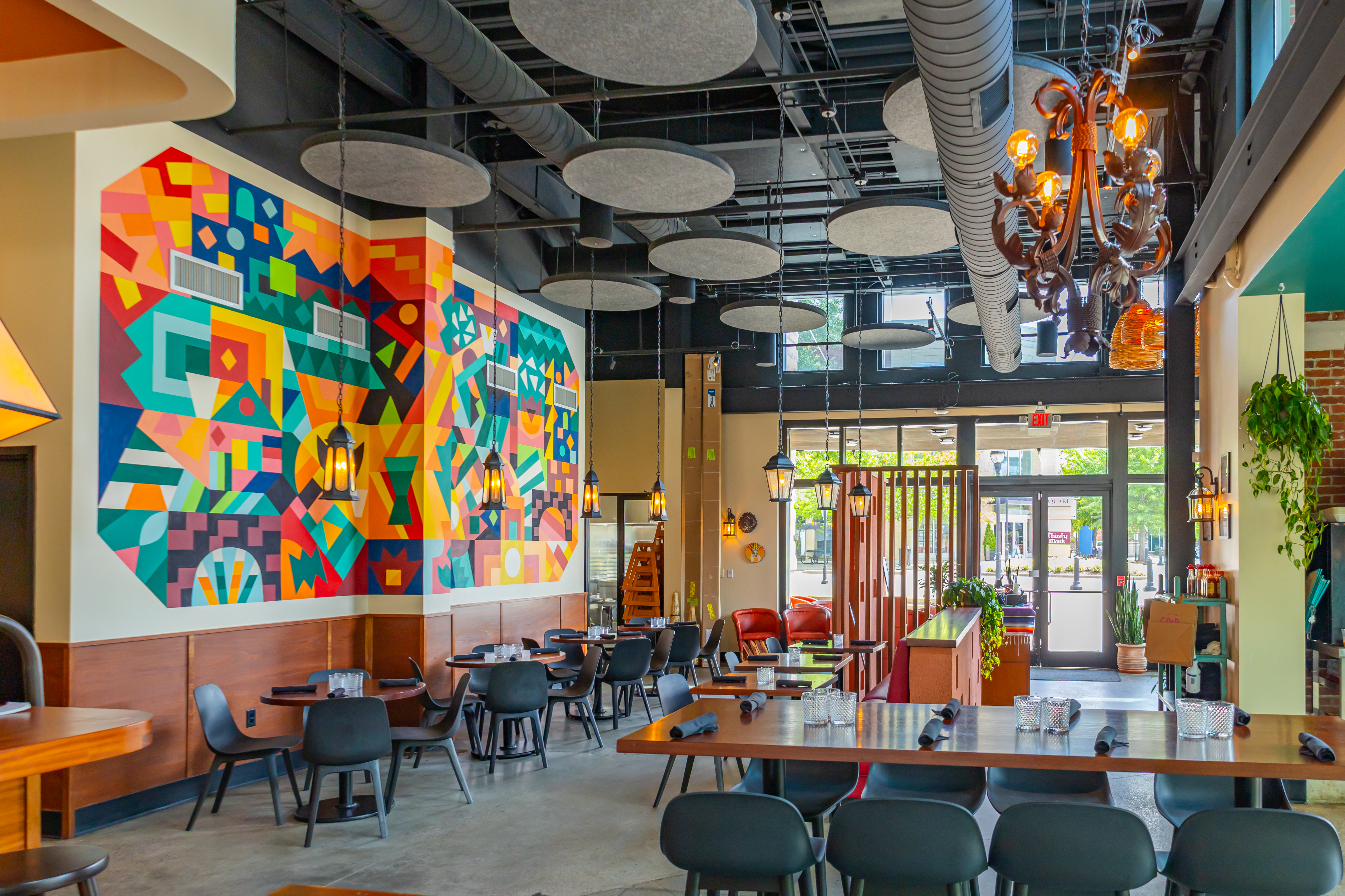 a room with tables and chairs