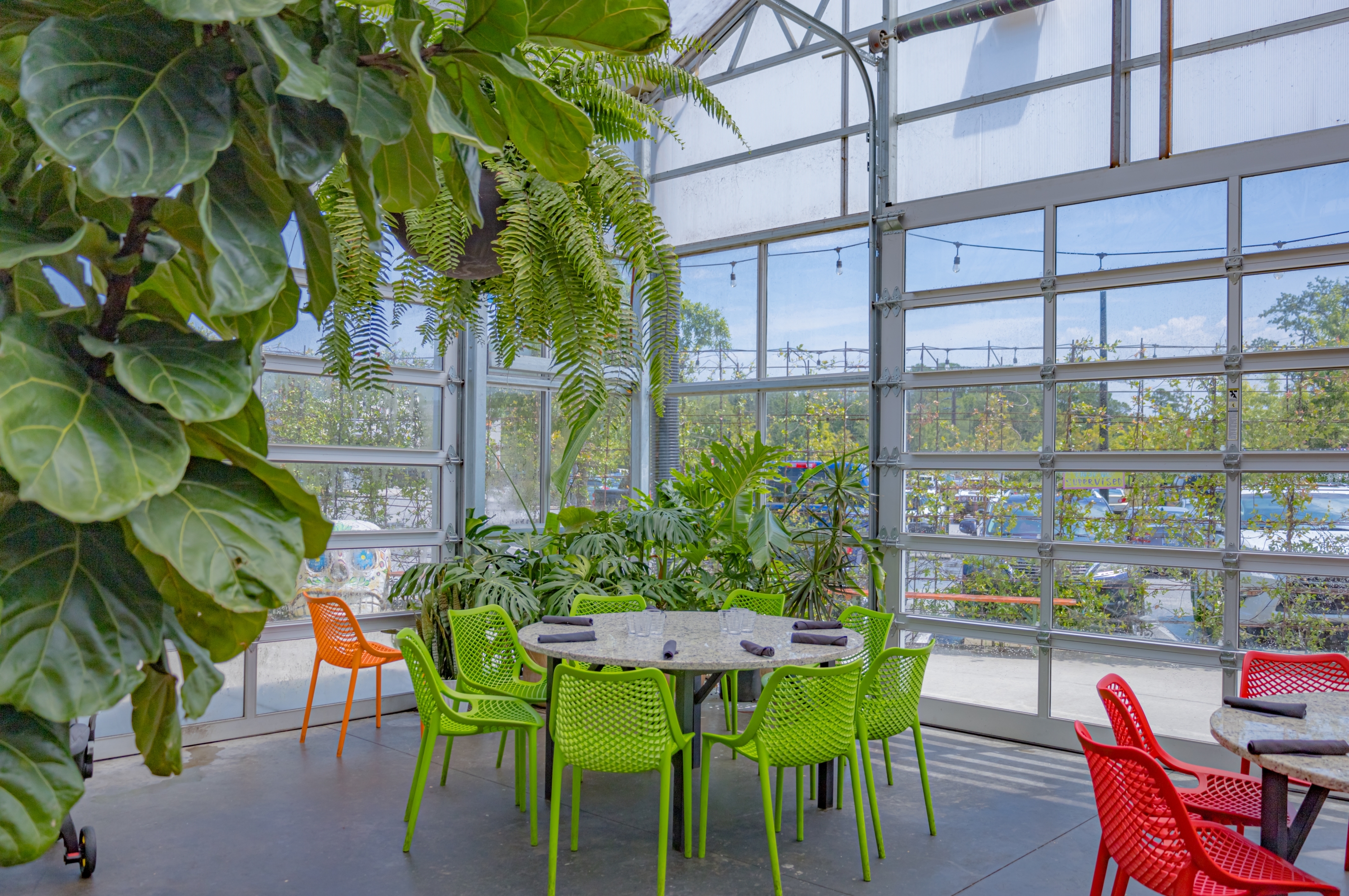 a room with tables and chairs