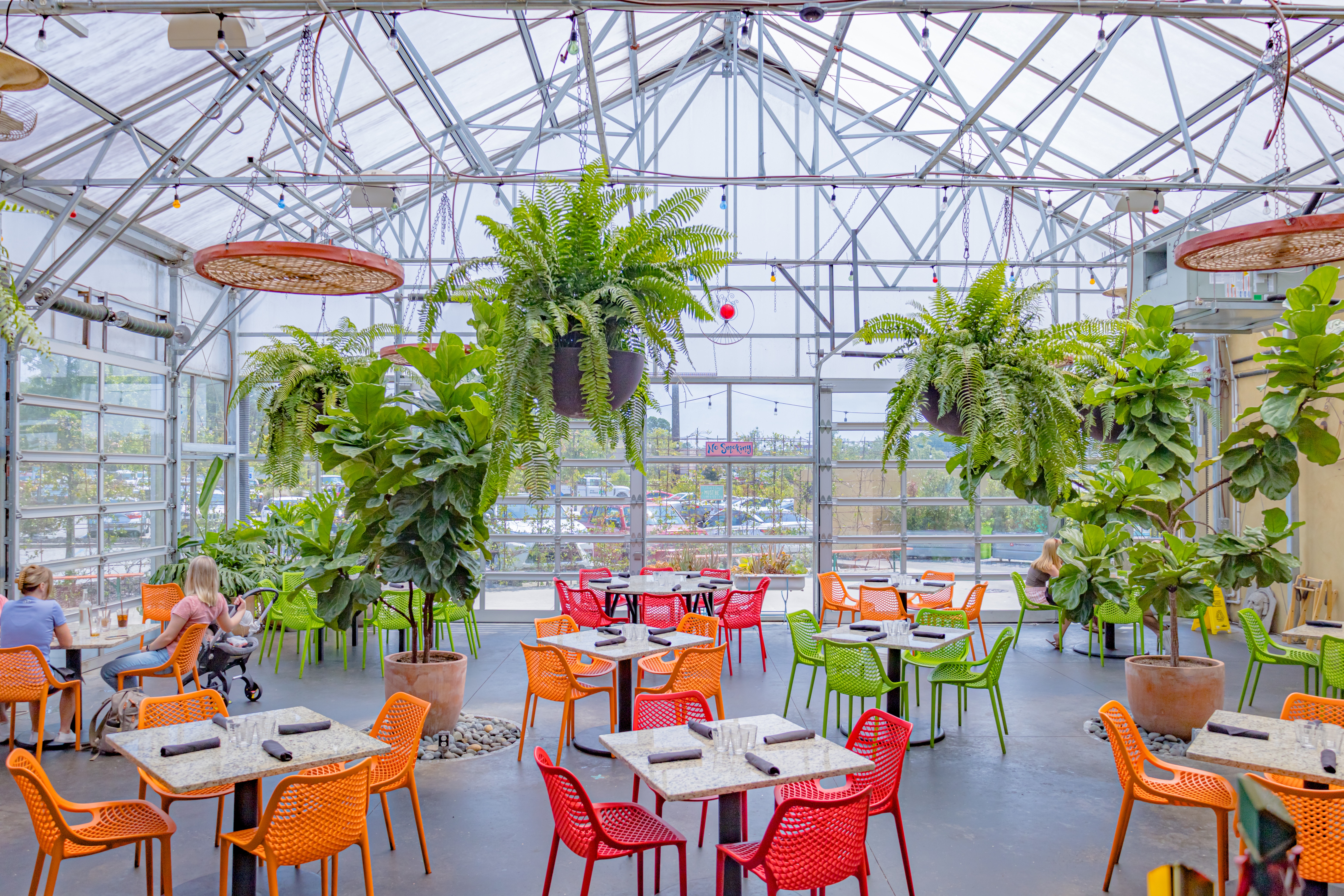 a room with tables and chairs