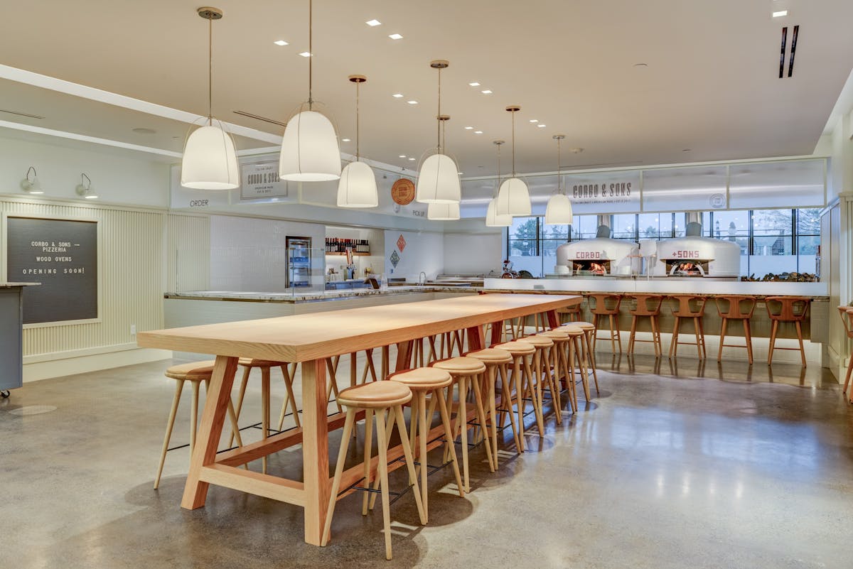 a dining room table in front of a building