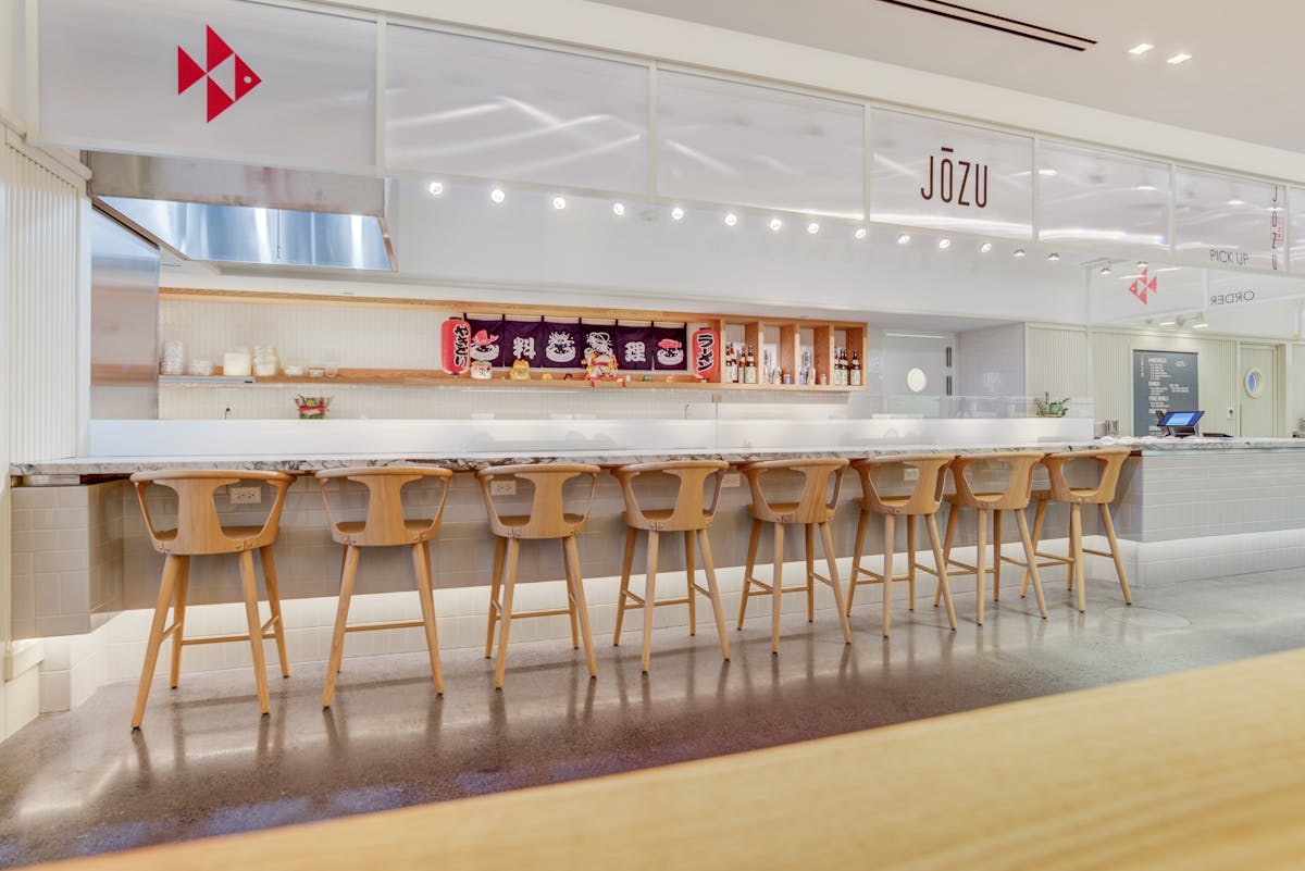 a dining room table in front of a building