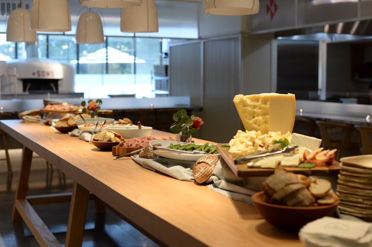 a kitchen with a plate of food on a table