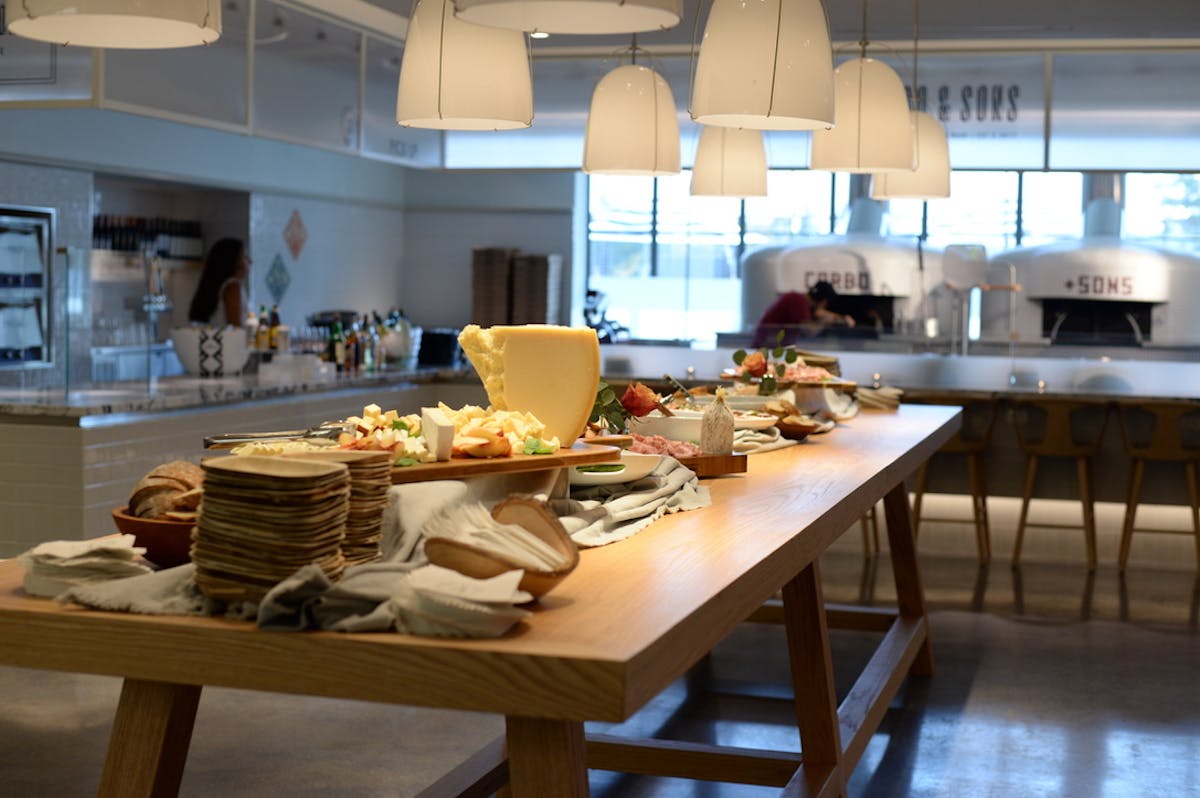 a kitchen with a dining table