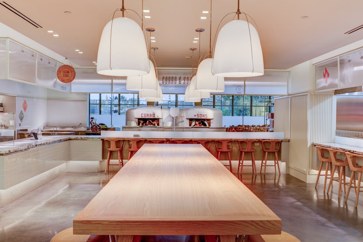 a dining room table in front of a building