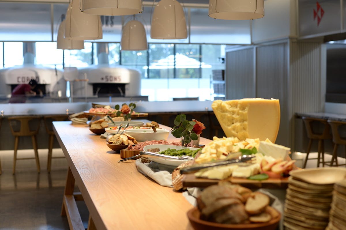 a kitchen with a plate of food on a table