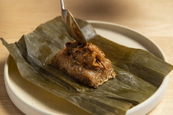 sticky rice tamal with duck confit