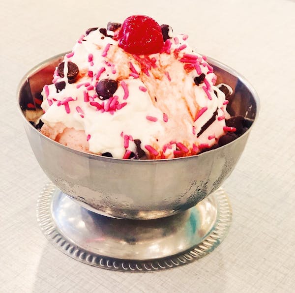 a bowl of dessert on a plate