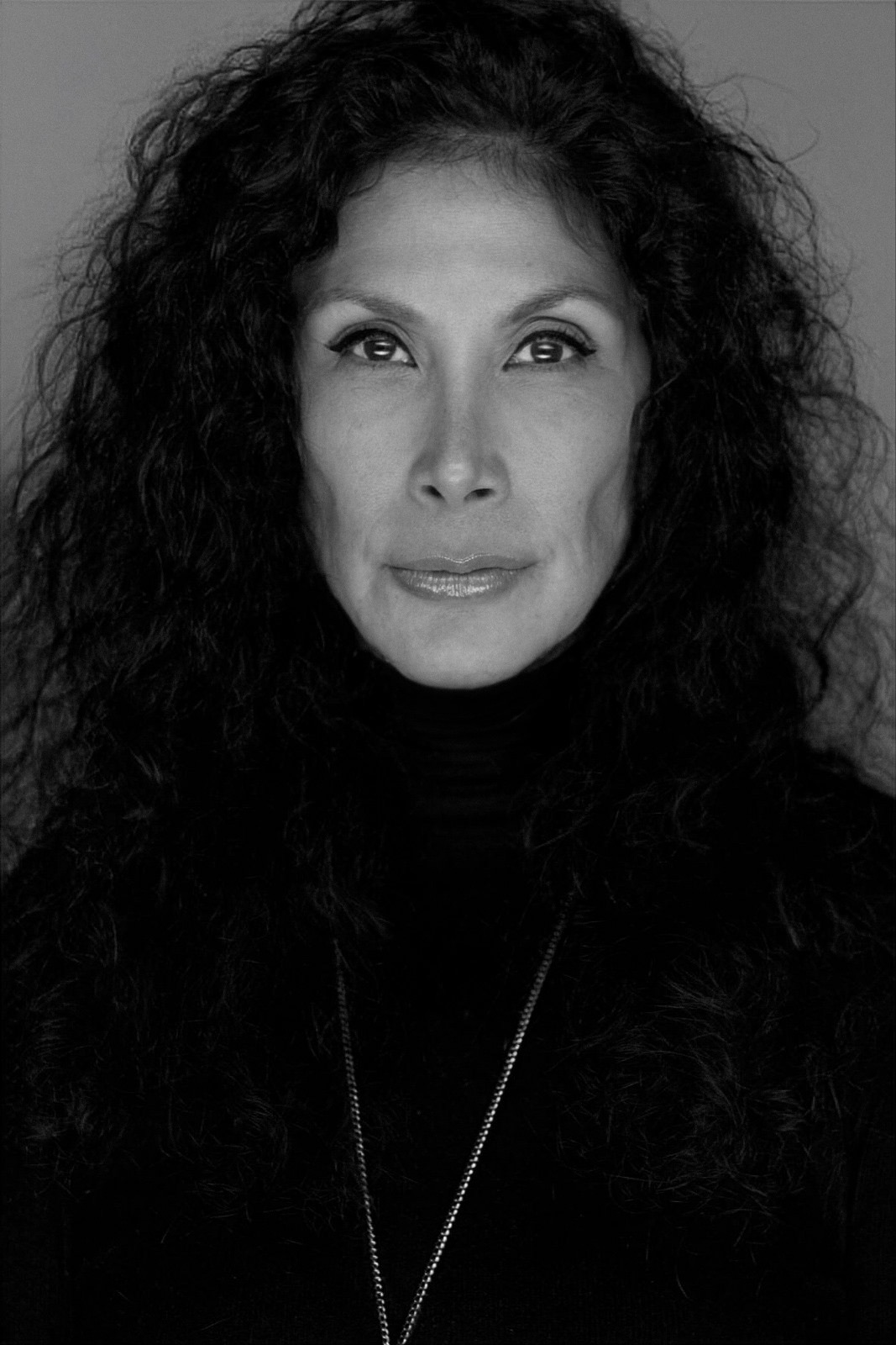 a woman looking at the camera