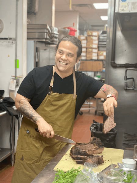 a person preparing food in a kitchen
