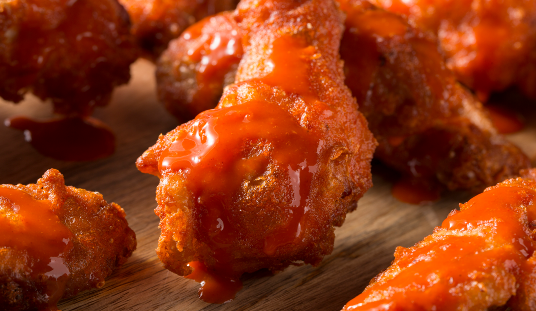 Wingers wings smothered in sauce