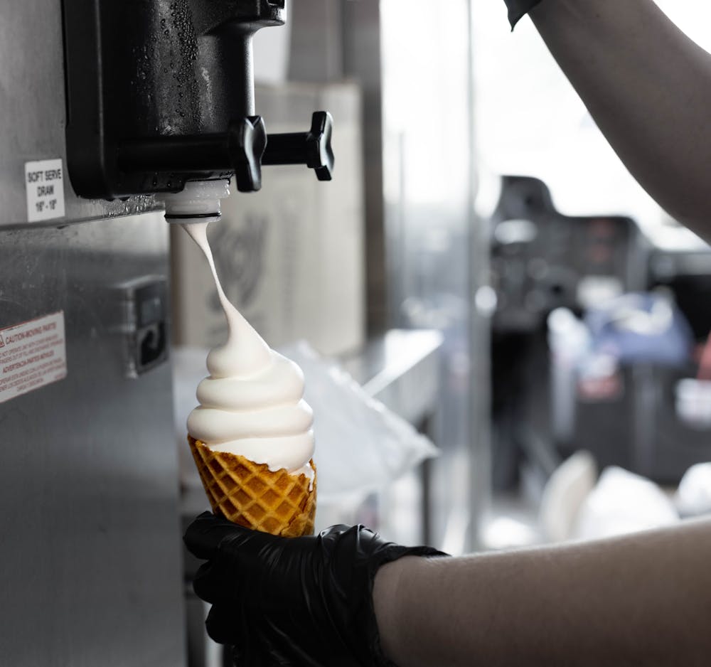 a person standing in front of a mirror posing for the camera