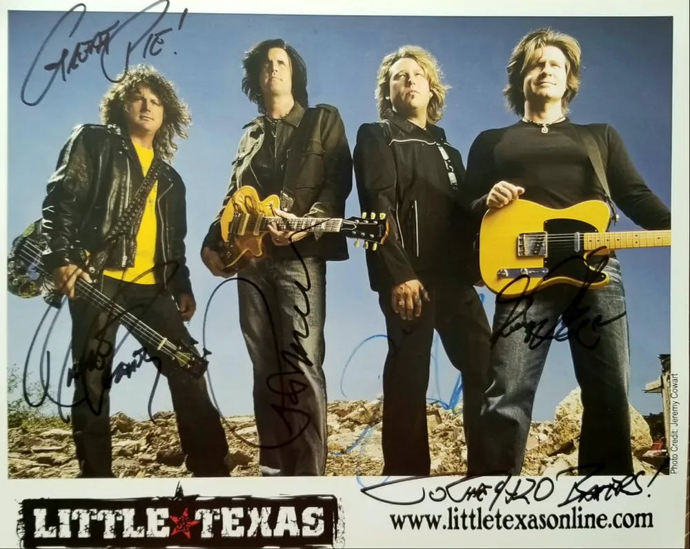 a group of people posing for the camera